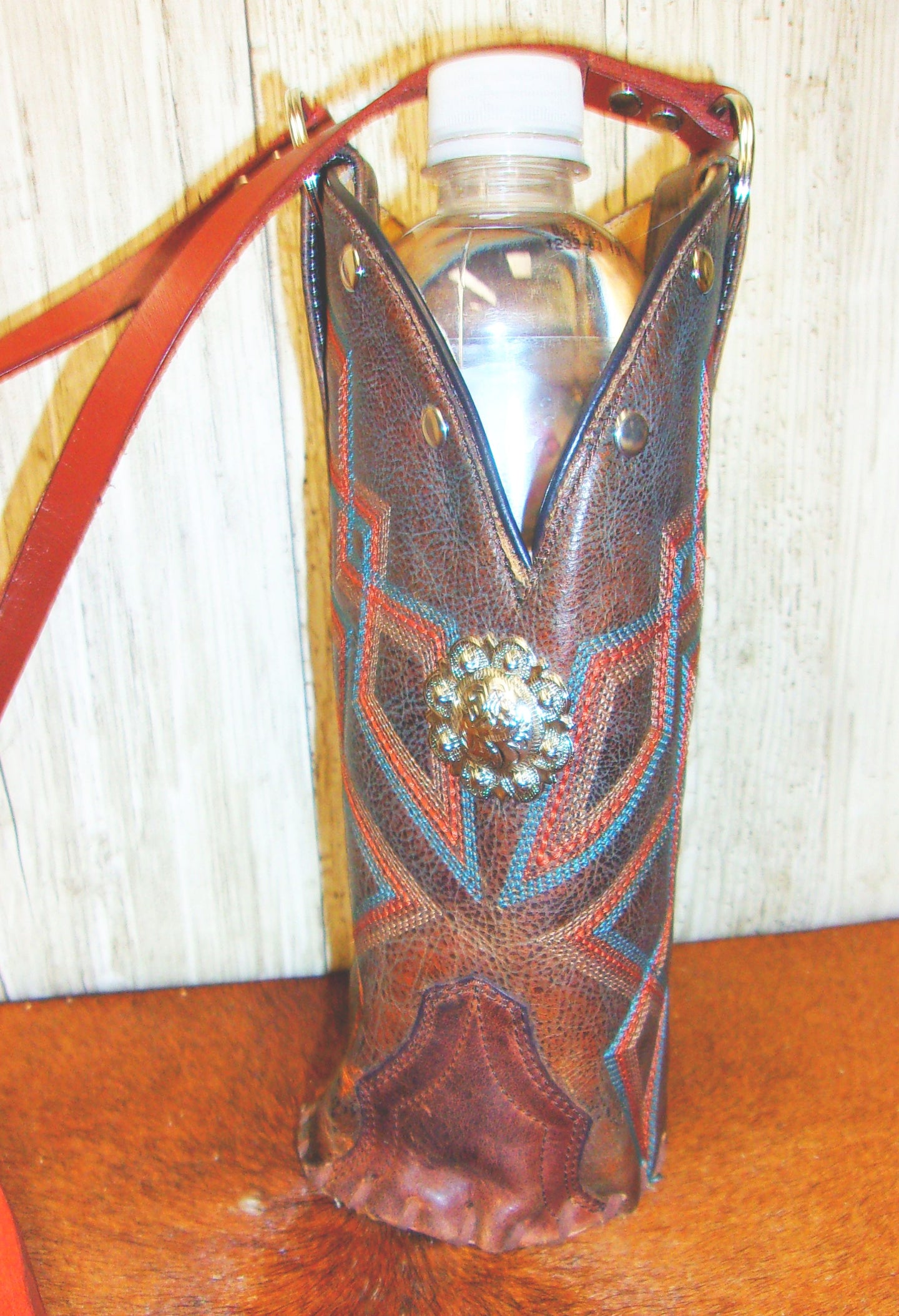 Cowboy Boot Wine Water Tote WA38 handcrafted from cowboy boots. Shop Wine Carrier Bags at ChrisThompsonBags.com and buy the best cowgirl wine tote, leather wine carrier, Leather Wine tote, recycled cowboy boots, unique gift for her, unique gift for him, water bottle caddy, water bottle holder, water bottle tote, western wine carrier, western wine tote, wine lovers gift, Wine Tote at Chris Thompson Bags.